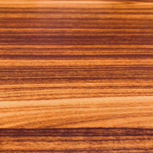 brown honey finished wood grain background perfect for a wallpaper or a text or image overlay